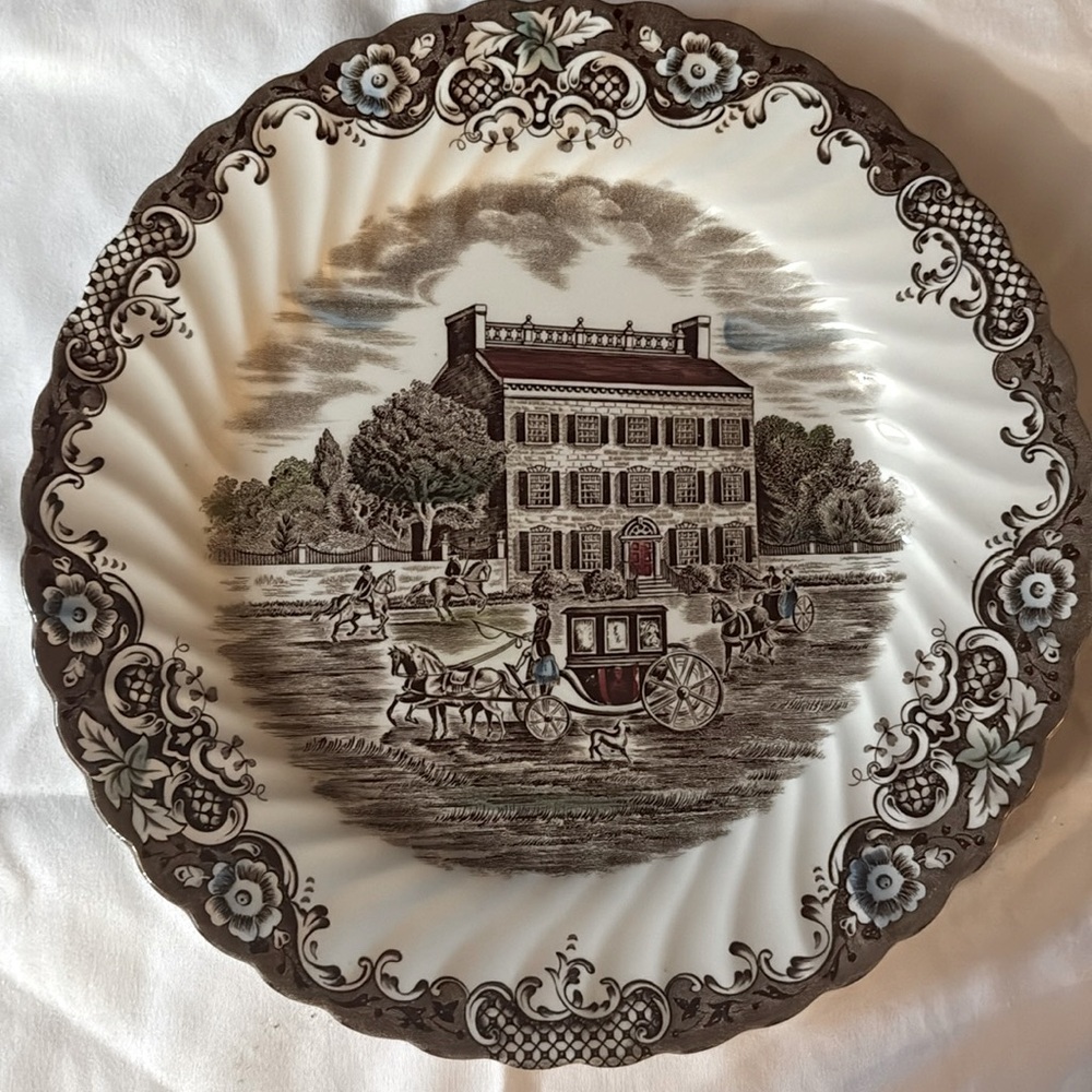 "Heritage Hall" dinner plate, featuring the "Georgian Town House" pattern